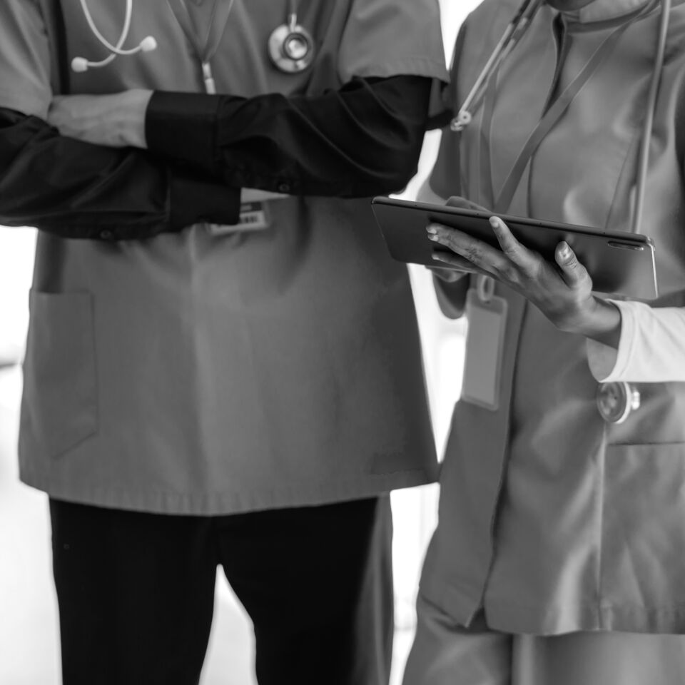 SINGLE-IMAGE_two-nurses-checking-tablet-data_aug25