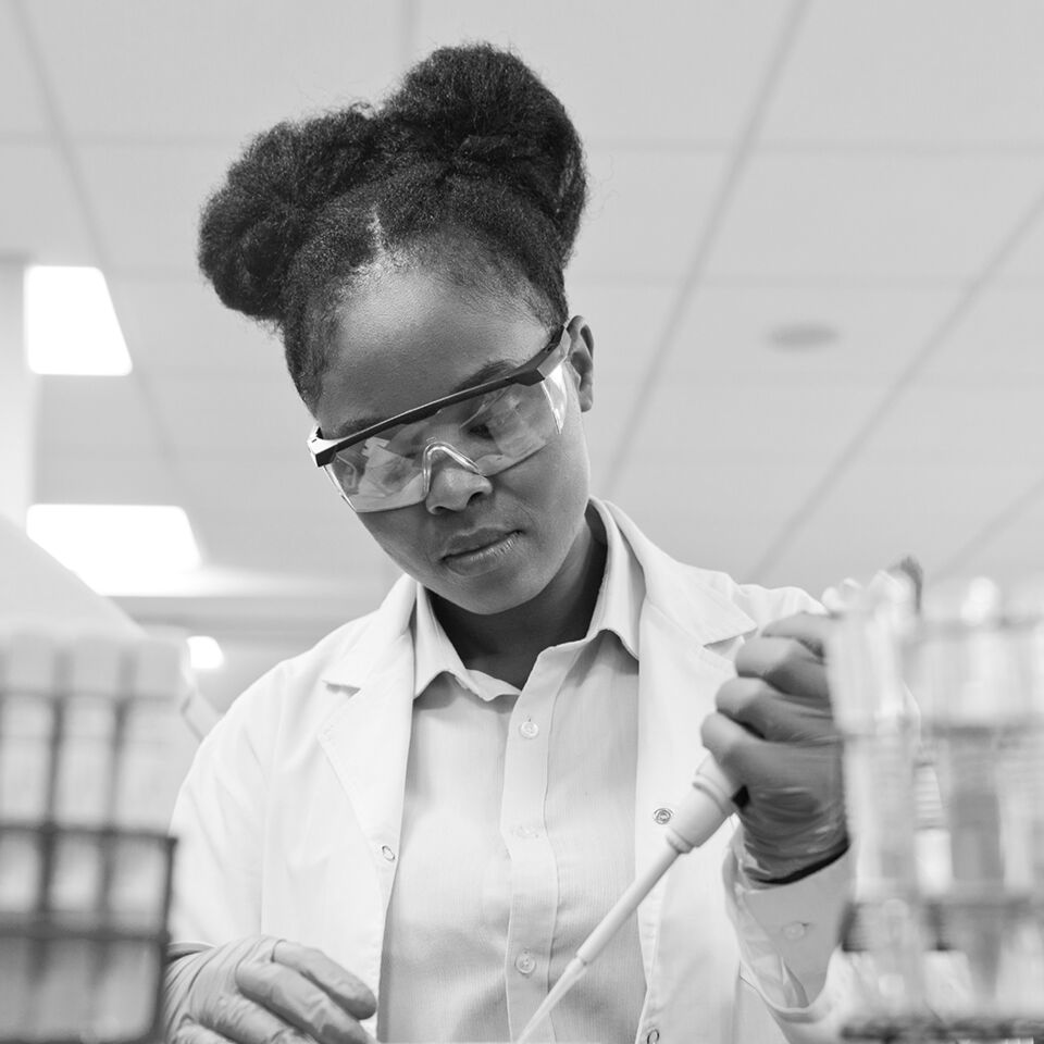 SINGLE-IMAGE_young-female-scientist-filling-chemical-through-pipette_mar25