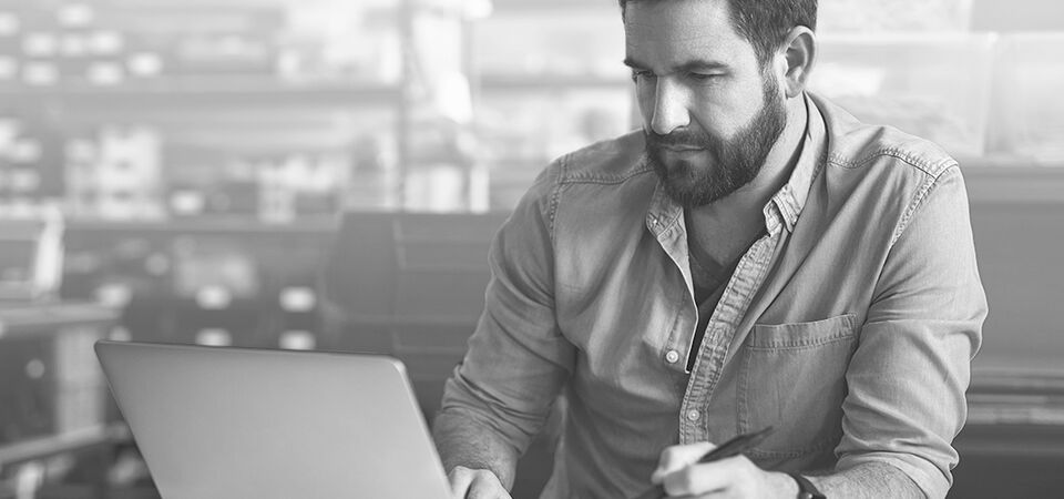 SINGLE-IMAGE_planning-architect-manager-with-laptop_may25