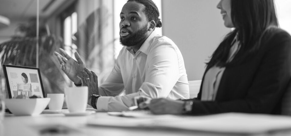 SINGLE-IMAGE_meeting-man-making-point_sept23