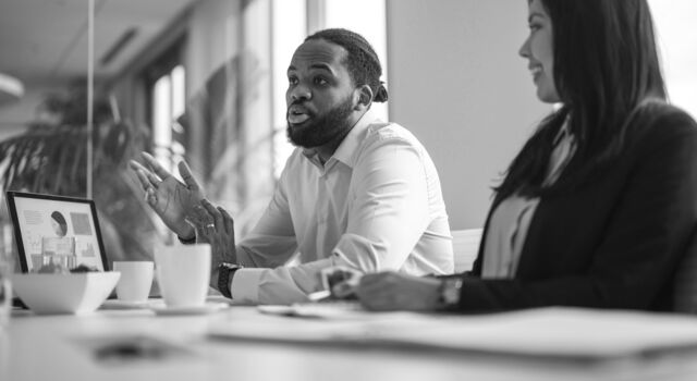 SINGLE-IMAGE_meeting-man-making-point_sept23