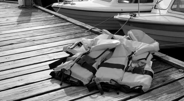SINGLE-IMAGE_life-jackets-on-deck-black-and-white_jul24