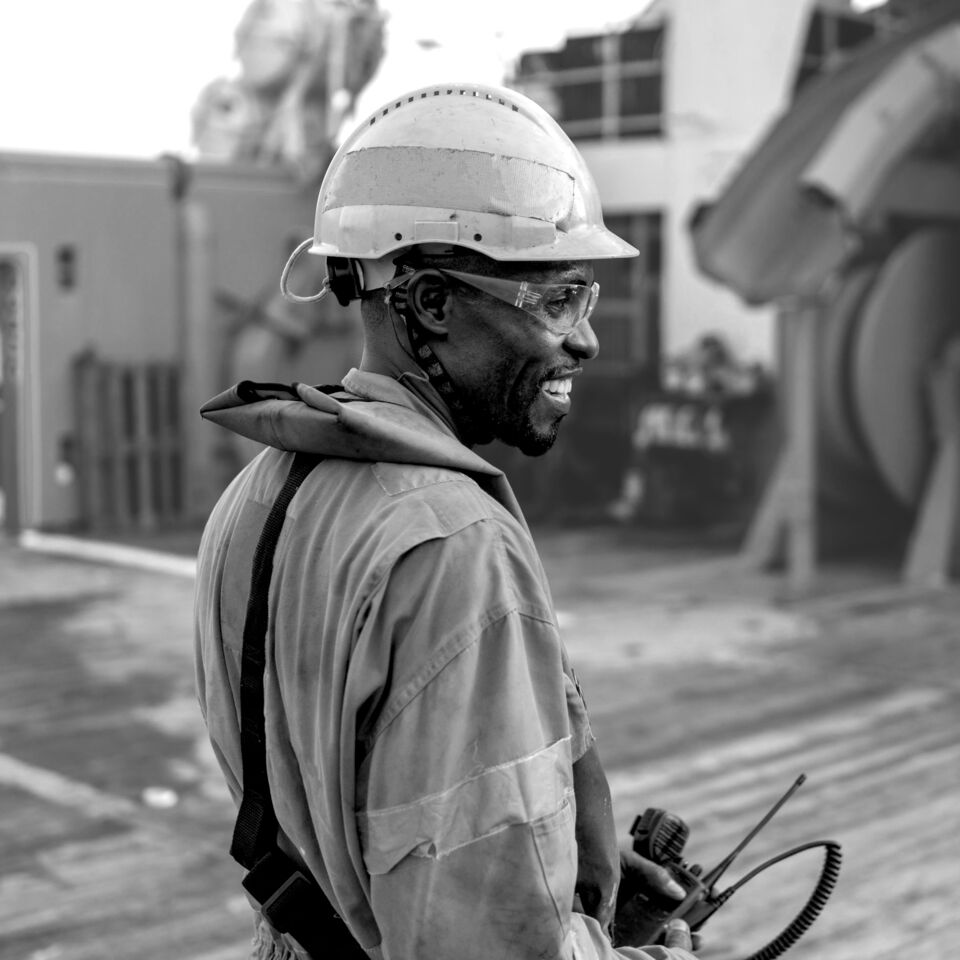 SINGLE-IMAGE_black-male-on-ship-deck_aug24