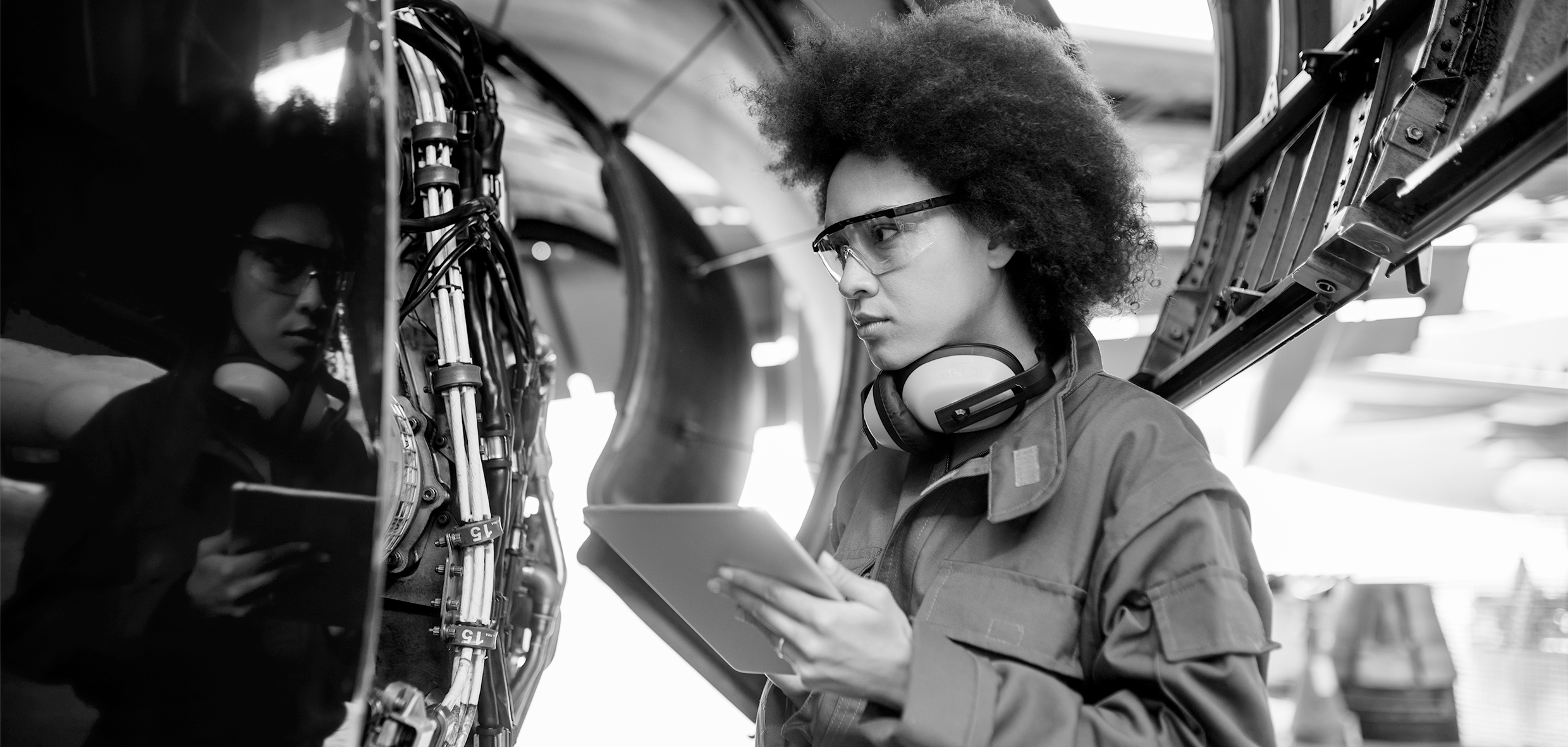 SINGLE-IMAGE_female-worker-checking-aeroplane_may24