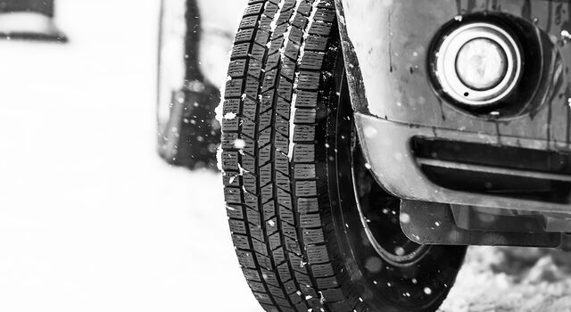 SINGLE-IMAGE_car-tires-on-winter-road_may24