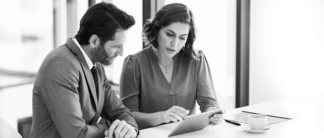 SINGLE-IMAGE_business-people-with-tablet_may25