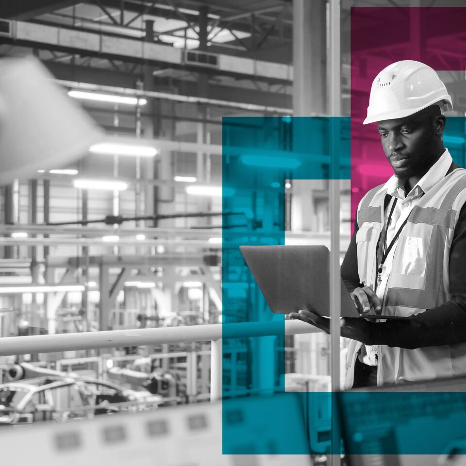 SINGLE-IMAGE_squares-man-hard-hat-in-factory-with-laptop_oct23